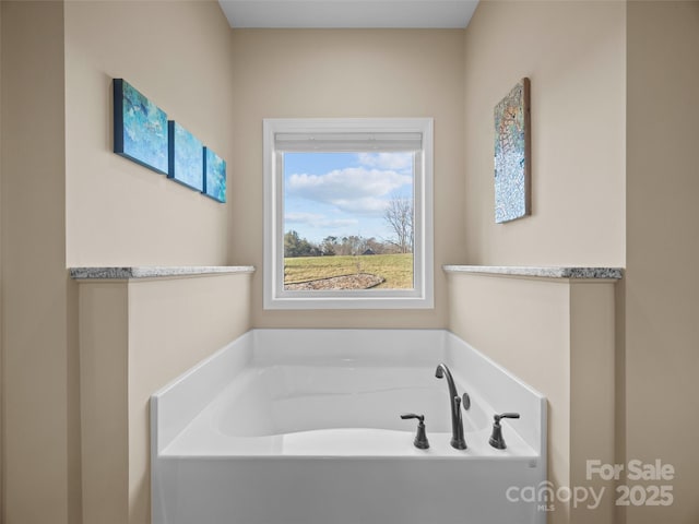 bathroom featuring a tub