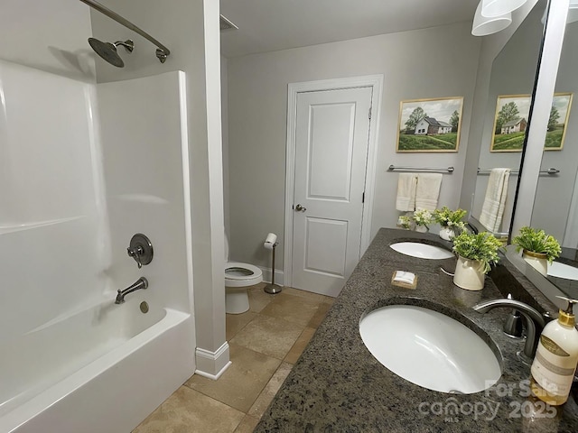 full bathroom featuring shower / tub combination, vanity, and toilet