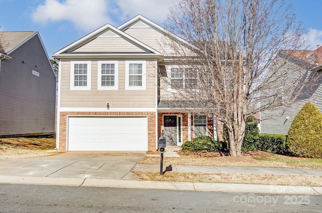 view of front of home with a garage