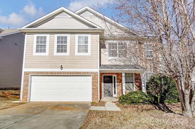 view of front of property with a garage