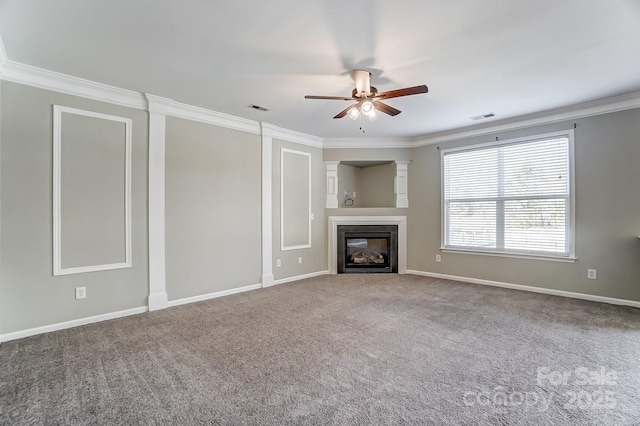 unfurnished living room featuring carpet flooring and crown molding