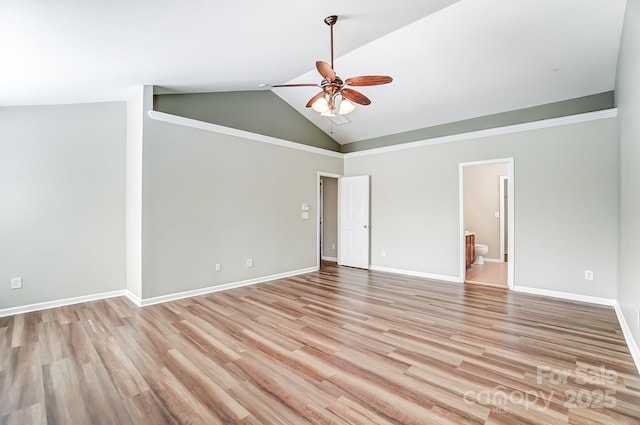 unfurnished room featuring ceiling fan, lofted ceiling, and light hardwood / wood-style flooring