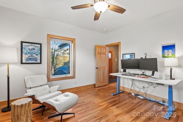 office area with ceiling fan and light wood-type flooring