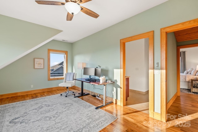 office space featuring ceiling fan and hardwood / wood-style floors