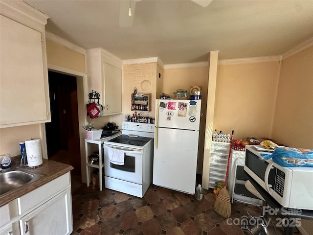 kitchen with white cabinets, white appliances, ornamental molding, and sink