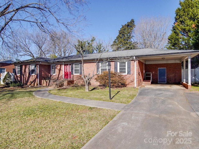 ranch-style house with a front lawn and a carport