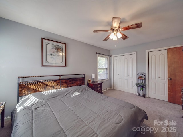 carpeted bedroom featuring ceiling fan