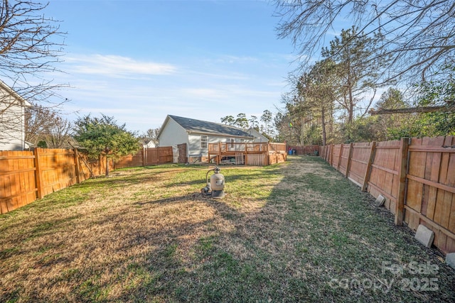 view of yard featuring a deck