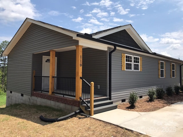 view of front of property featuring covered porch