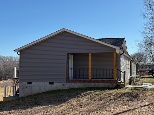 view of home's exterior featuring a porch