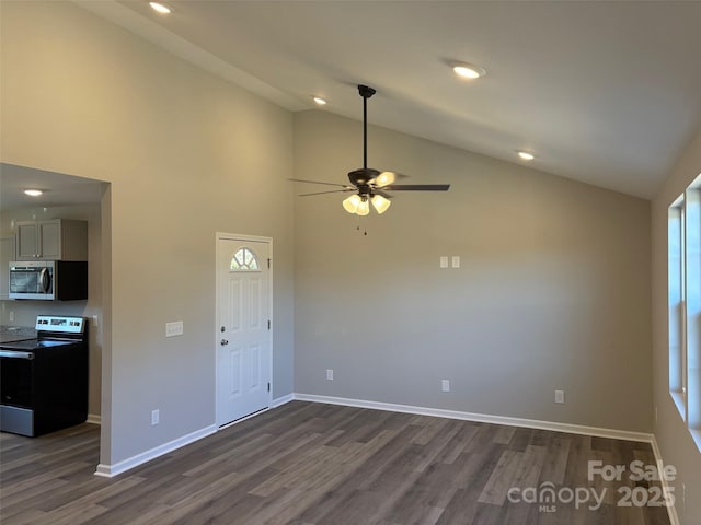 unfurnished living room with ceiling fan, high vaulted ceiling, and dark wood-type flooring