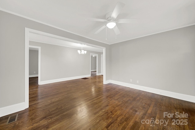 unfurnished room with dark hardwood / wood-style floors, crown molding, and ceiling fan with notable chandelier