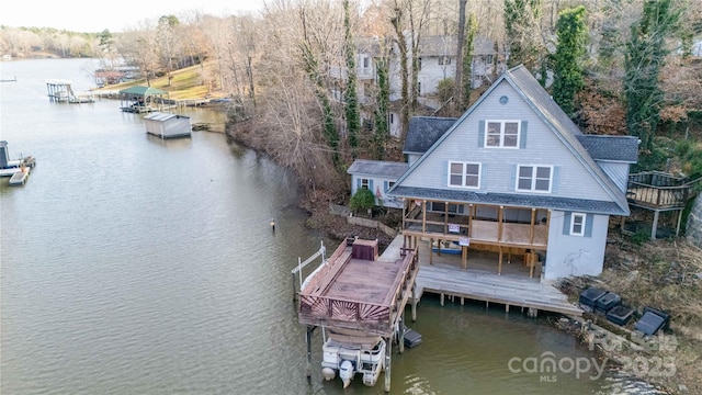 dock area with a deck with water view