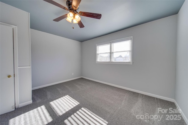 carpeted empty room with ceiling fan