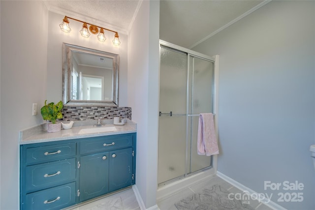 bathroom featuring decorative backsplash, tile patterned floors, vanity, a shower with door, and crown molding