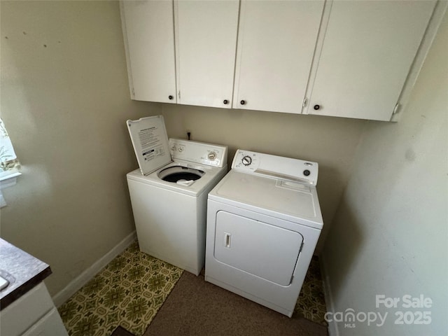 laundry area featuring cabinets and independent washer and dryer