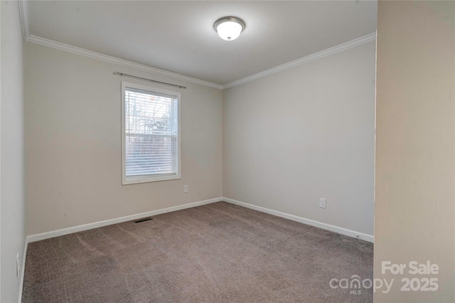 unfurnished room with carpet and ornamental molding