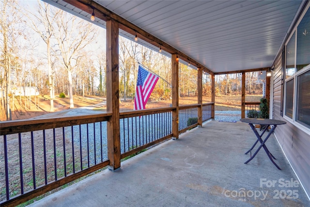 view of patio featuring a porch