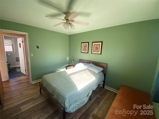 bedroom featuring ceiling fan and dark hardwood / wood-style flooring