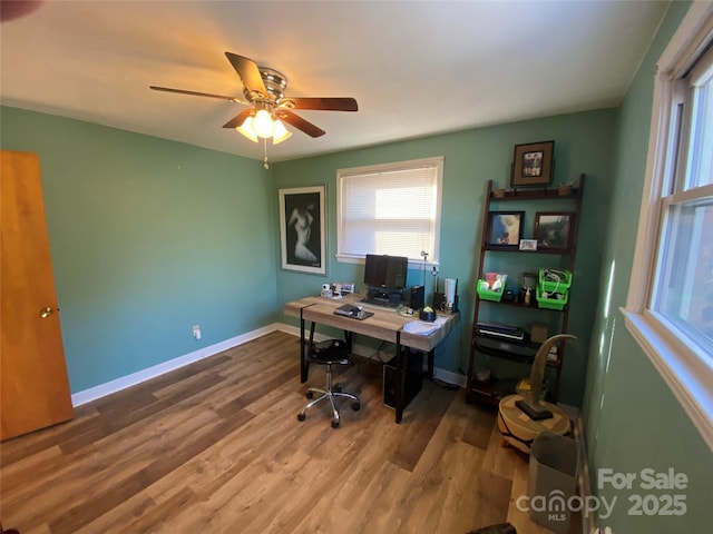 office space featuring ceiling fan and hardwood / wood-style flooring