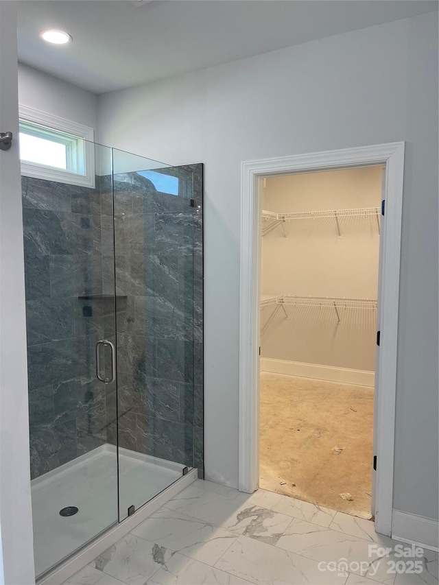 bathroom featuring an enclosed shower