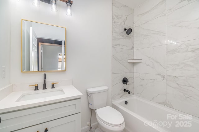 bathroom featuring toilet, washtub / shower combination, and vanity