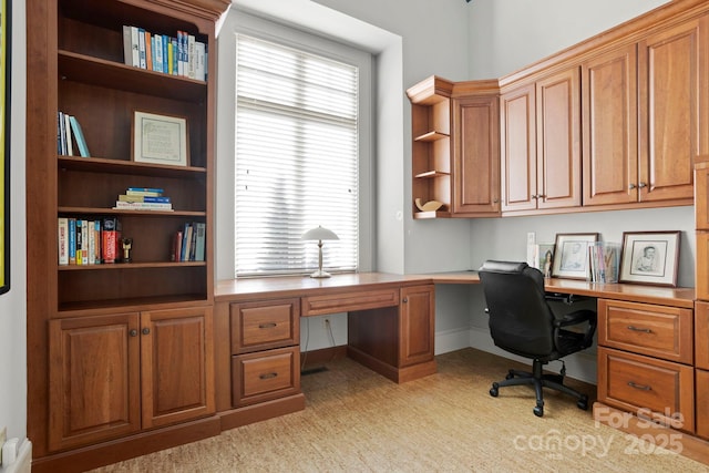 office featuring built in desk