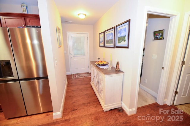 hall featuring light hardwood / wood-style floors