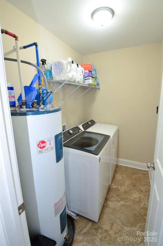 clothes washing area with electric water heater and washing machine and dryer