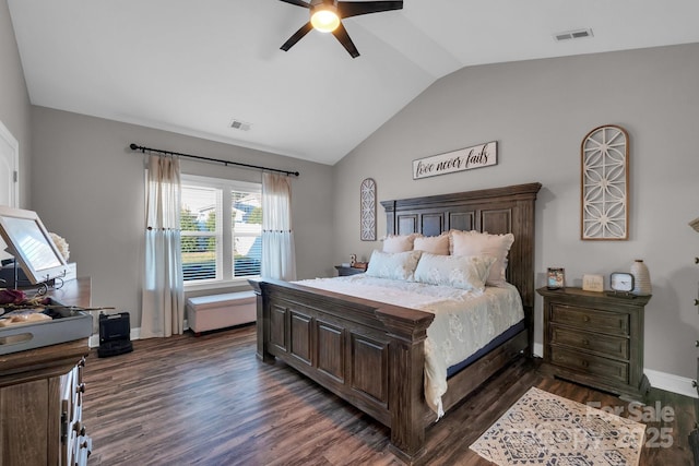 bedroom featuring ceiling fan, vaulted ceiling, and dark wood-type flooring