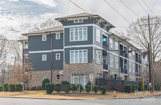 view of home's exterior featuring brick siding