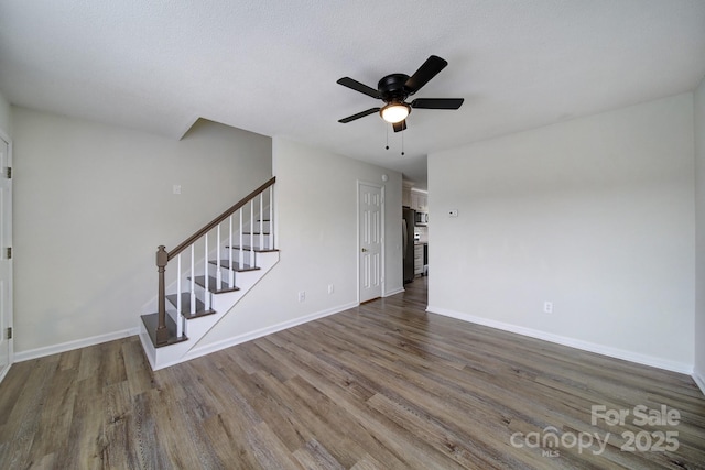 438 Stoneycreek Ln, Rock Hill, SC 29730 - unfurnished living room with wood-type flooring, a textured ceiling, and ceiling fan