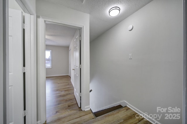 438 Stoneycreek Ln, Rock Hill, SC 29730 - hallway with light wood-type flooring and a textured ceiling