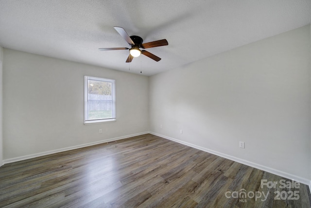 438 Stoneycreek Ln, Rock Hill, SC 29730 - empty room featuring ceiling fan, dark wood-type flooring, and a textured ceiling