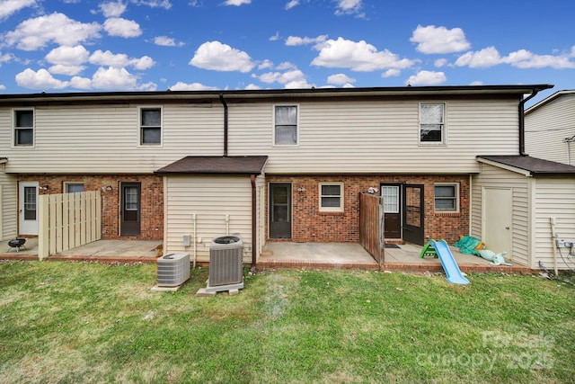 438 Stoneycreek Ln, Rock Hill, SC 29730 - back of house with central AC, a yard, and a patio
