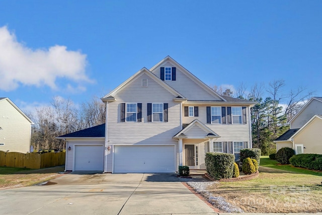 front of property with a garage