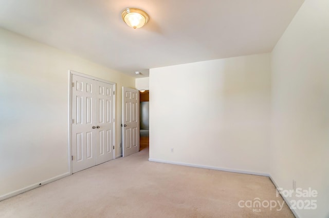 empty room featuring carpet floors