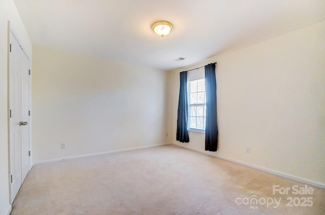 view of carpeted spare room