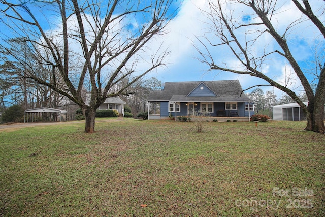 view of front of home featuring a front lawn, a porch, and a carport