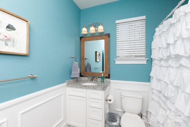 bathroom with vanity and toilet