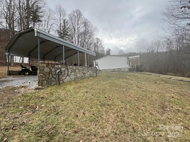 view of yard featuring a carport