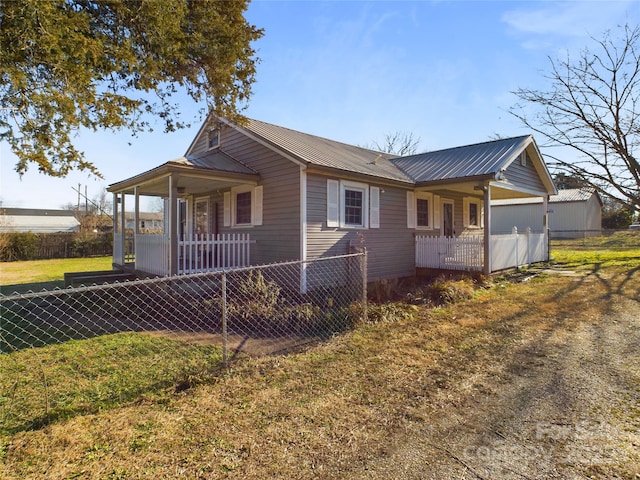 ranch-style house with covered porch