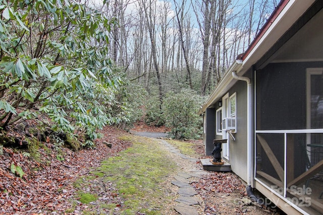 view of yard featuring a sunroom