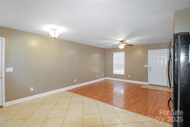 interior space featuring ceiling fan