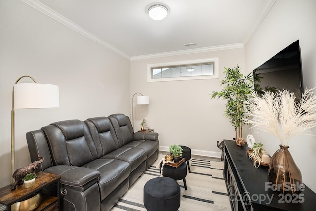 living room featuring crown molding