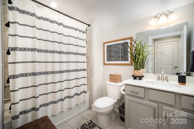 full bathroom featuring tile patterned floors, vanity, toilet, and shower / tub combo with curtain