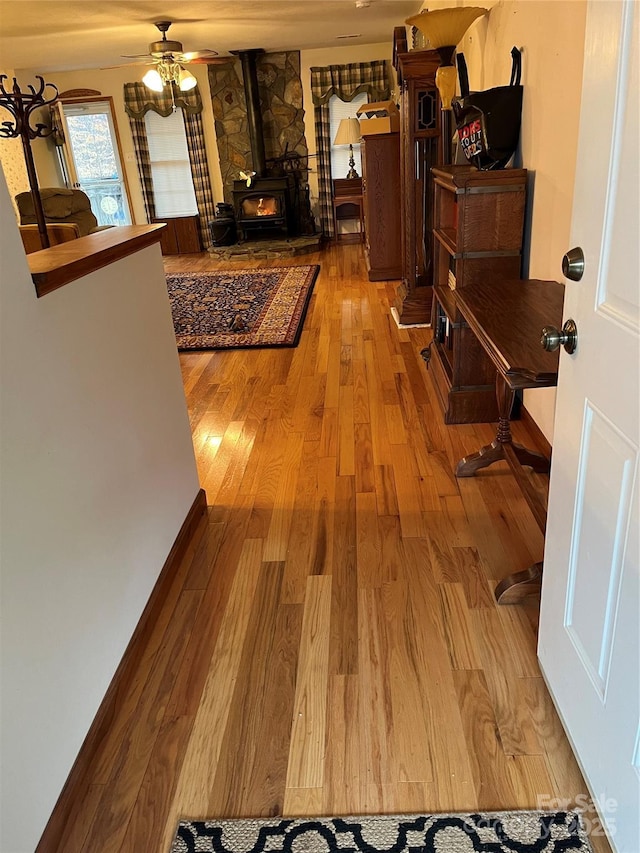 hall with wood finished floors