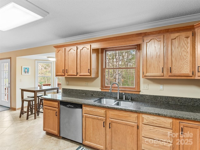 kitchen featuring a textured ceiling, dishwasher, crown molding, and sink