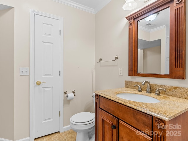 bathroom featuring crown molding, tile patterned flooring, vanity, and toilet