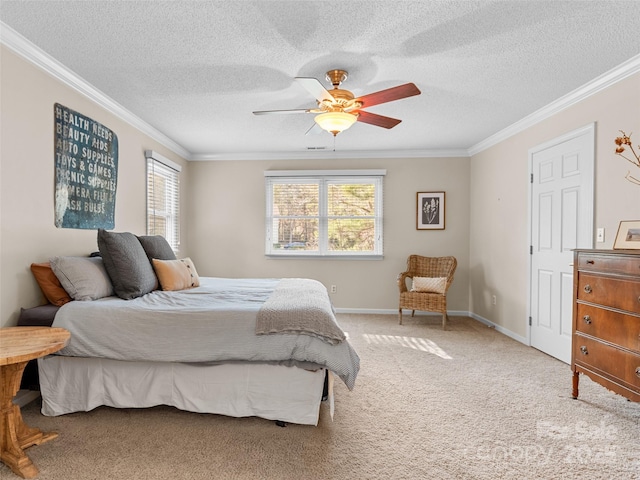 carpeted bedroom with ceiling fan, crown molding, and a textured ceiling